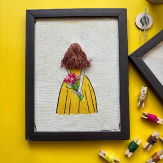 Embroidered wall art frame – handmade girl with flowers in yellow dress